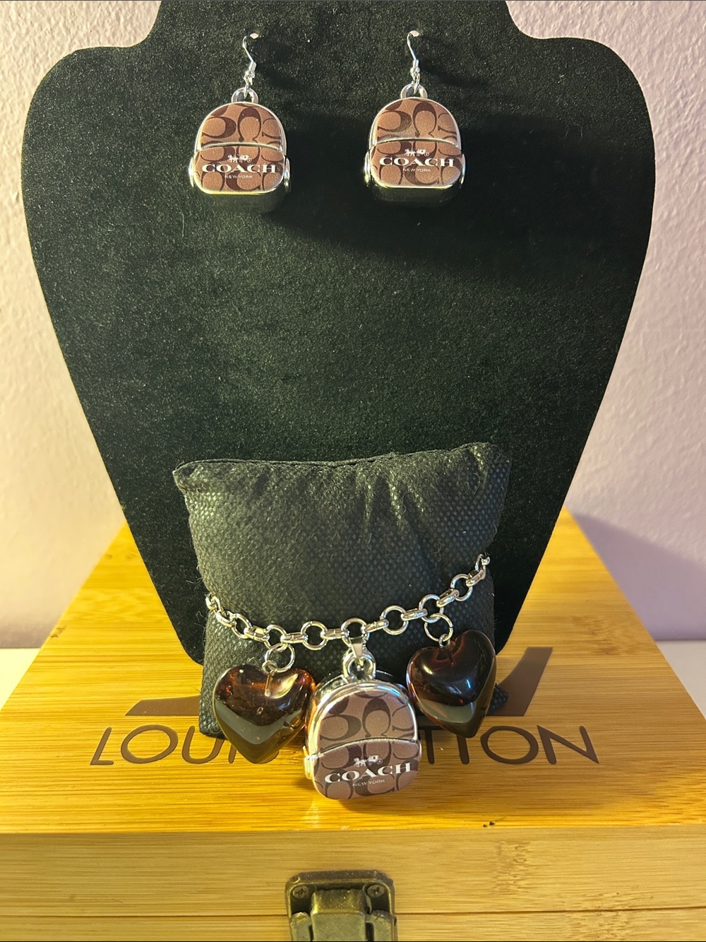 Backpack and Heart Charm Bracelet With Matching Earrings